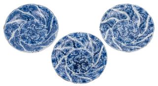 A matched set of three Chinese blue and white spiral moulded deep dishes: each painted overall with
