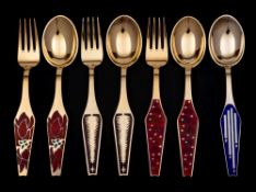 A group of four Danish silver-gilt and enamel commemorative spoons and forks: cased,