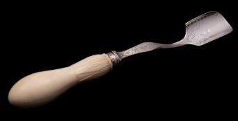 A Victorian silver stilton scoop, maker Reid & Sons,