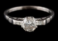 A diamond single-stone ring: with circular brilliant-cut diamond 5.6mm x 3.6mm approximately 0.