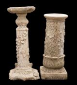 A reconstituted stone pedestal:, the cylindrical column with ivy leaf and berry decoration,