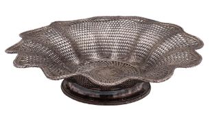 A Christofle silver-plated woven wire work bread basket: of lobed circular form with wavy edge