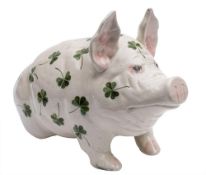 A large Bovey Tracey Weymss pig: modelled in seated position and decorated with shamrock,