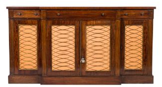A Regency mahogany, rosewood and brass inlaid side cabinet:, bordered with lines,