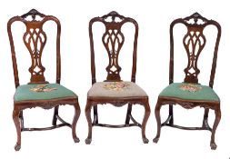 A set of six 18th Century Portuguese carved rosewood dining chairs:,