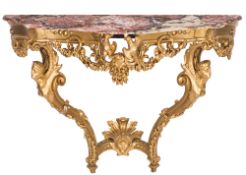 A 19th Century French carved giltwood serpentine fronted console table:,