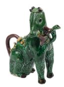 A Chinese egg and spinach glazed teapot and cover: in the form of a seated horse holding lingzhi