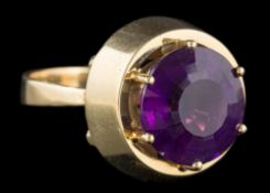 A circular amethyst single-stone ring: the shank stamped '585' approximately 7.