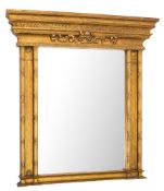 A contemporary gilt wood architectural overmantel mirror:,