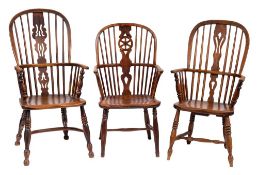 A 19th Century elm, ash and beechwood stick back Windsor elbow chair:,