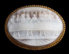 A 9 carat gold oval shell cameo brooch depicting The Last Supper: within a rope twist frame,