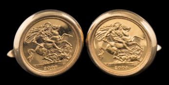 A pair of half sovereign cufflinks: the 2004 half sovereigns in cufflink settings,