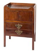 A George III mahogany adapted tray top commode:, the shaped top with carrying handles,