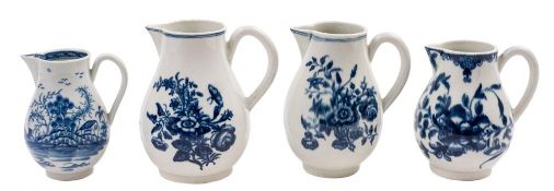 A group of four First Period Worcester blue and white sparrow beak cream jugs: one painted in 'The