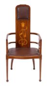 An Art Nouveau inlaid mahogany occasional armchair:, bordered with boxwood lines,