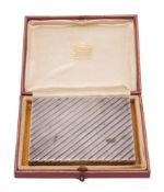 For Cartier, an Elizabeth II silver cigarette case, maker Padgett & Barham Ltd, London,