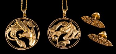 A Chinese circular pendant: with dragon motif on chain with 'S' shaped clasp,