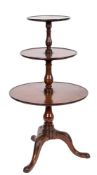 A George III mahogany three tier circular graduated dumb waiter:,