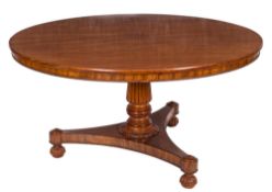 A William IV mahogany circular breakfast table:, the snap top with a beaded apron,