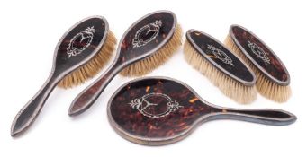 A five piece silver and tortoiseshell dressing table set, maker Hasset & Harper, Birmingham,