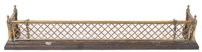 A 19th Century brass and pierced lattice rectangular fender:, with knopped finials,