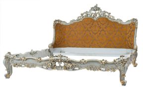 A French carved giltwood and pastel blue painted king size bed in the Rococo taste:,