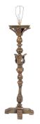 An Italianate carved giltwood and olive green decorated torchere:,
