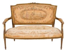 A French carved giltwood five piece salon suite in the Louis XVI taste:,