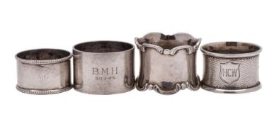 A mixed lot of silver napkin rings, various makers and dates: total weight of silver 136gms, 4.40.
