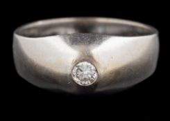 A French 18 carat gold and diamond ring: the brilliant cut diamond estimated to weigh 0.