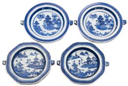 Two pairs of Chinese blue and white warming dishes: painted with lake views with pagodas and other