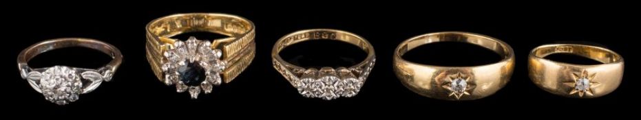 Five various rings: an 18ct white gold and diamond circular cluster ring,