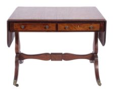 A Regency mahogany and inlaid sofa table:, bordered with ebonised lines,