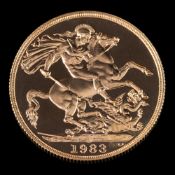 A gold two pound coin: 1983, in a green leather case with paperwork, 15.98gms.