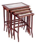 A set of Biedermeier mahogany quartetto tables:,