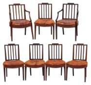A set of six George III mahogany dining chairs in the Hepplewhite taste:,