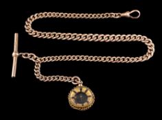 A 9ct gold albert chain: composed of curb links, with a compass attached, stamped 375, 33cm long,