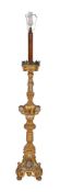 An Italianate carved giltwood torchere:, fitted for electric light,