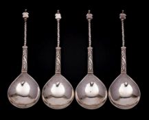 A set of four Continental silver armorial spoons,