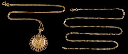 A gold coloured Madonna pendant: the circular pendant with an image of the Madonna,