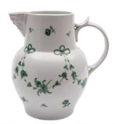 A Bristol [William Cookworthy] mask jug: of bulbous form with tapering neck,