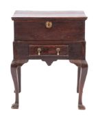 An 18th Century oak bible box on a stand:, with a rectangular moulded hinged top,