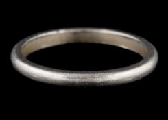 A wedding band: stamped 'Platinum', ring size Q, 4.