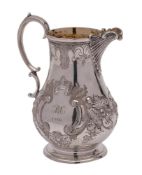 A Victorian silver cream jug, maker Martin, Hall & Co, London, 1875: initialled and dated,
