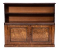 A 19th Century rosewood bookcase:, with ripple moulded decoration,