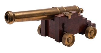 A bronze desk cannon:,