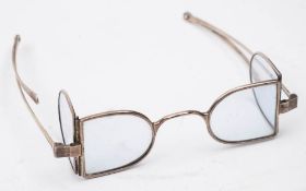 A pair of early 19th century silver 'D' shaped railway glasses: with clear double lenses and