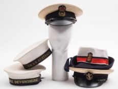 Two Royal Navy Class II Sailors' hats:, one with tally for HMS Devonshire,