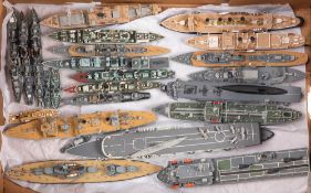 A group of twenty-six scratch built wooden waterline scale models of Royal Navy ships by Tony
