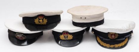 Four Royal Navy Officers' peaked caps and a Class II sailor's hat: (5)